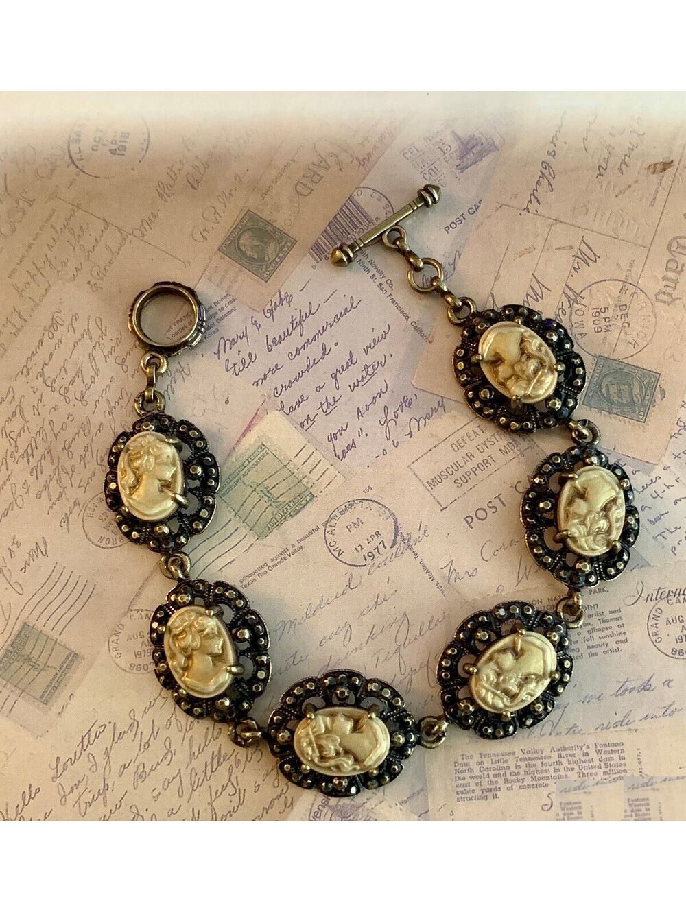 Charming Cameo Bracelet with Intricate Metalwork & Classic Elegance